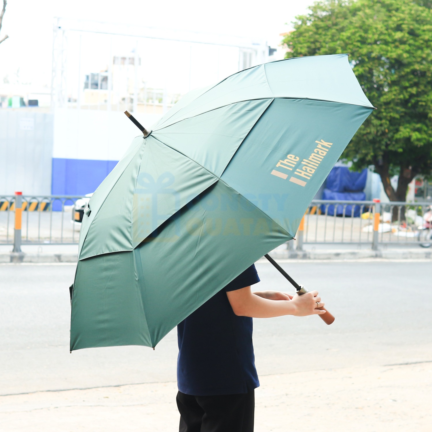Umbrellas provide practical rainy-season value while keeping your company visible in a subtle, useful way