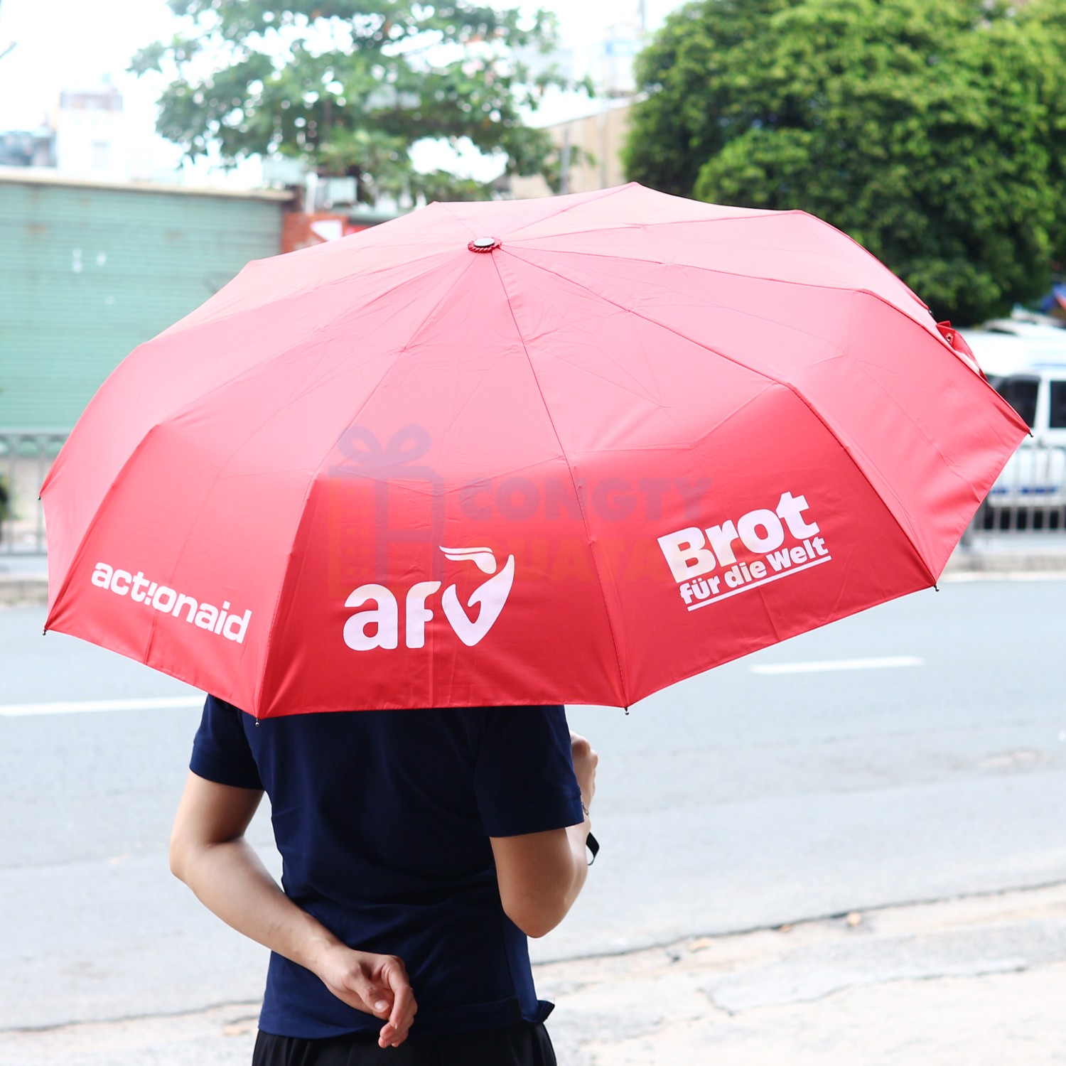 Branded umbrellas offer practical, premium donor recognition with visible campaign branding Branded umbrellas offer practical, premium donor recognition with visible campaign branding